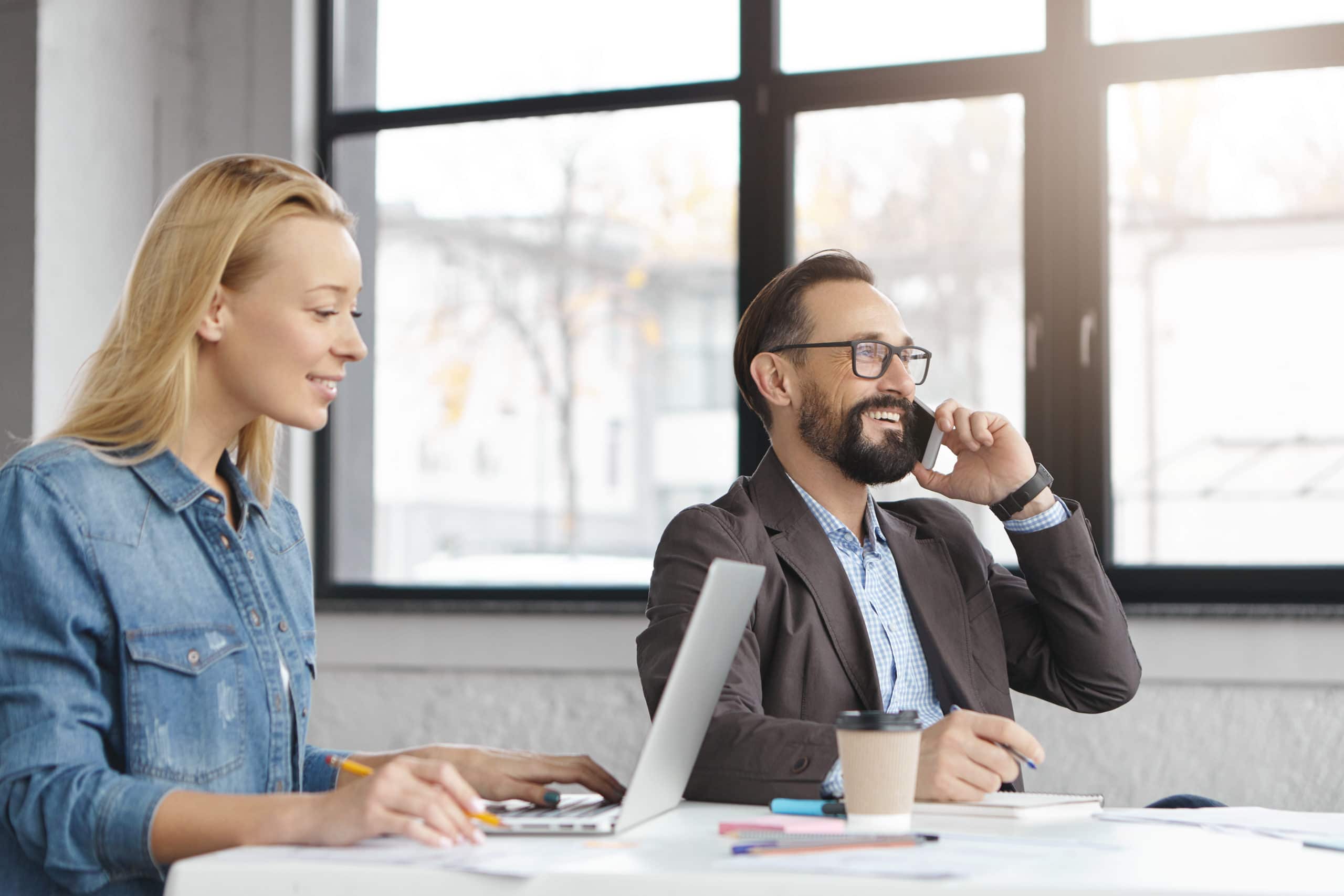 you-x-ventures-nF0nQuqBsrI-unsplash Agent and Brokers on Phone